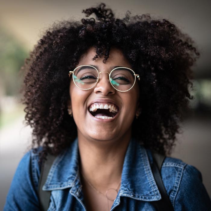 Portrait of happy woman in the park