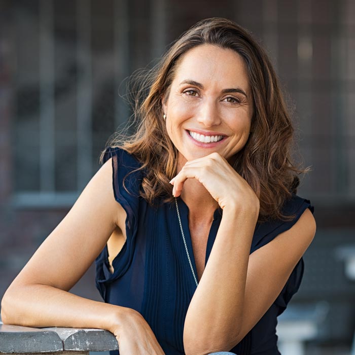 Happy mature woman outdoors